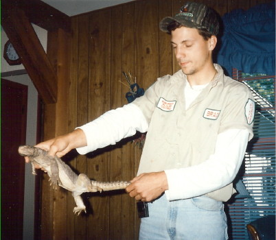 Brad with a lizard he caught many years ago.